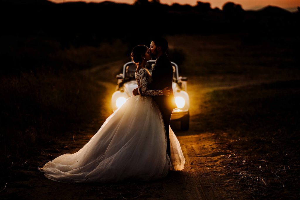 Married couple posing for their destination wedding video.